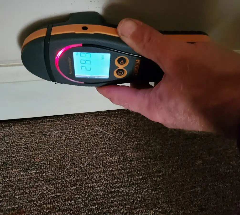 Moisture detection at baseboard during Burst Pipe Cleanup in Mooresville